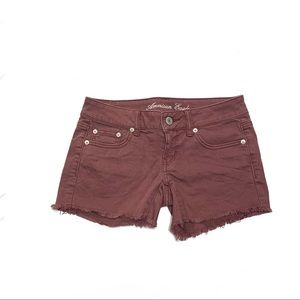 American Eagle Burgundy Stretch Distress Hemline Jean Short Size 0